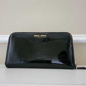 Miu Miu Black Patent Leather Zippy Wallet with Bow..